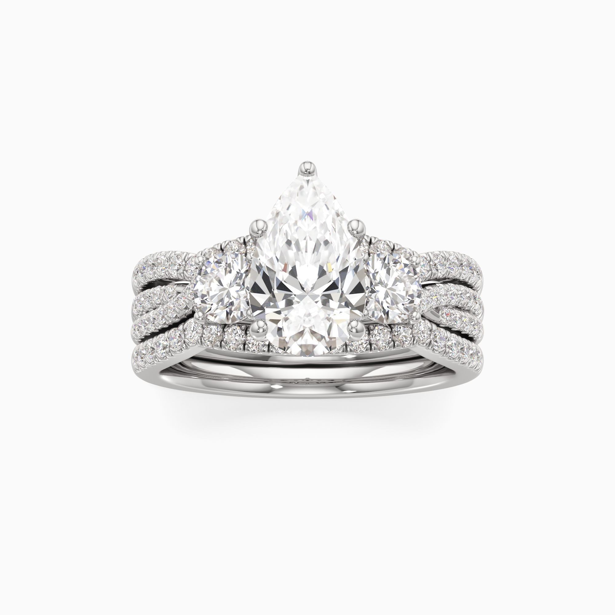 Paola Lab Grown Diamond Pear-Shaped Engagement Ring with Wedding Bands - Through Finger view – Image 3 of 4